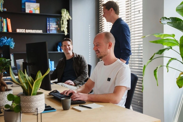 Part of the MICE Operations team working at the MICE headquarters