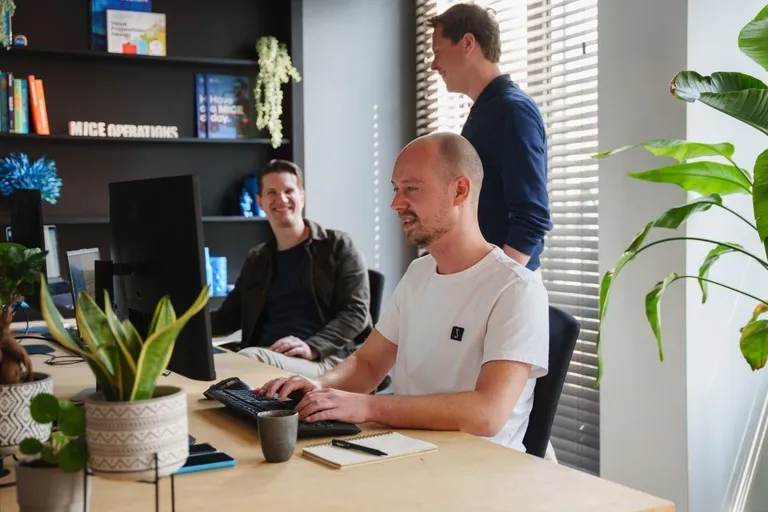 Part of the MICE Operations team working at the MICE headquarters